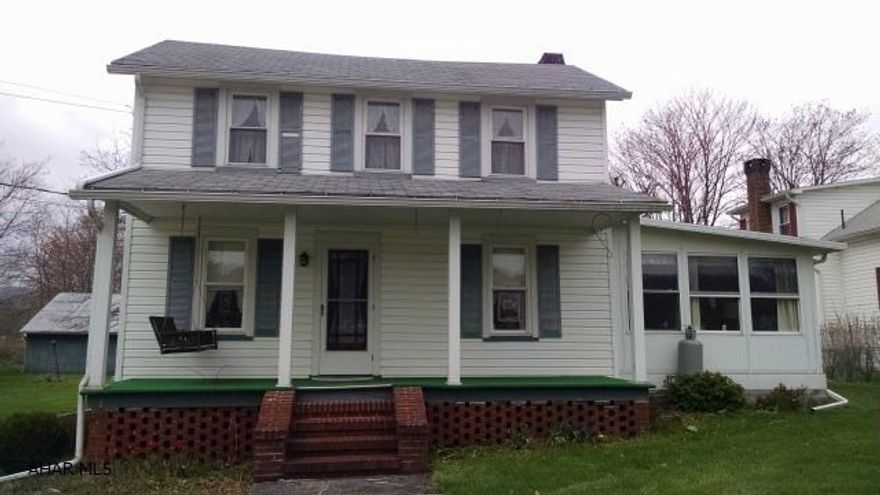 Adorable 2.5 story vinyl, updated windows, CA, .80 acres flat lot, 2 car detached garage - cute package, motivated seller - bring offers!