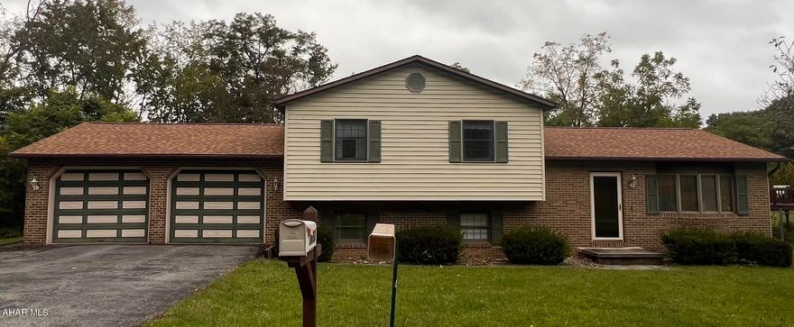 Adorable multi-level home with so much potential!  This home has a newer roof (2017), newer C/A (2019), 3 bedrooms, 2 full baths, a partially finished basement, and a 2 car garage!! Enjoy the outdoors on your deck on over a 1/4 of an acre in a beautiful neighborhood just off of St. Francis Lane!  Call me for your showing today!