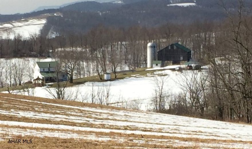 Nestled in the foothills of the Allegheny Mountains lies this 102 acre farmette conveniently located near I-99, Rt 30 and Rt 56 with quick access to Trout fishing, State Park, a ski resort, golf and State Game Lands! A blacktop driveway leads to the beautifully maintained private home which takes in gorgeous views of the lush countryside. A large restored bank barn, insulated chicken coup, out buildings and car port (2 car) are included. The house has undergone extensive restoration and the workmanship is of the highest quality. Abundant wildlife make this a hunter's nature or bird lovers paradise. Timber value, great pasture land and very low taxes of less than $1200/year make this a must see property.