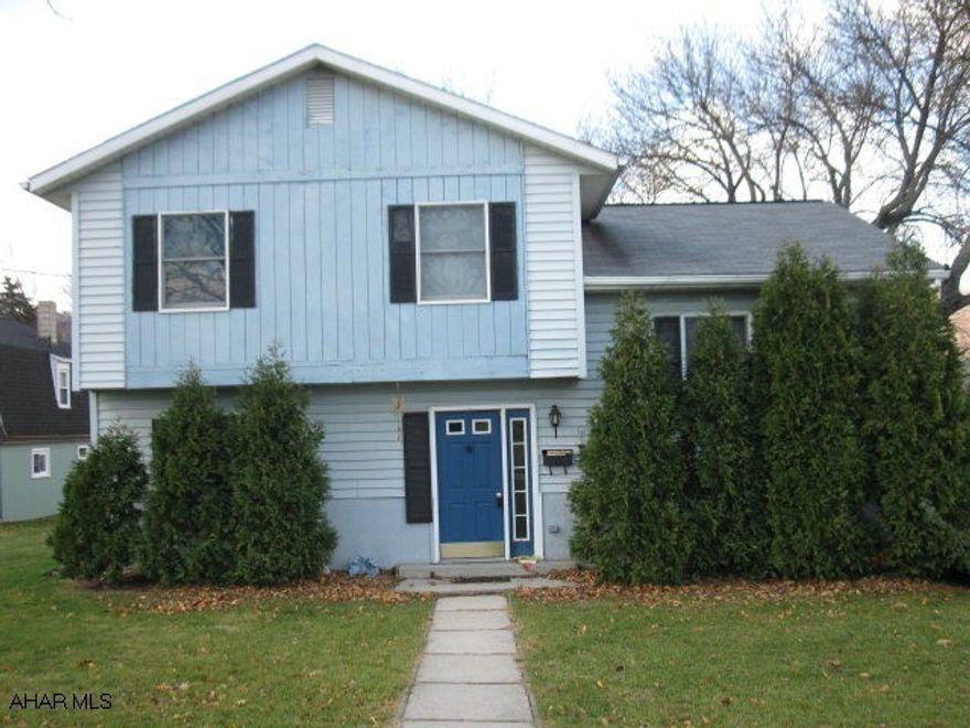 Great Potential for Handyman or Contractor. Small 3 bed 2 bath split level in great neighborhood near the football field. One car integral garage, enclosed screened porch, nice level yard with off street parking.  Home has freeze damage and needs TLC. Property being sold in As Is condition.