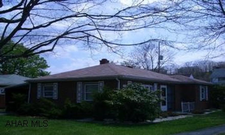 Great potential for starter home or investment property.  Needs some work.  Nice area of Hollidaysburg.  2 BR, 1 Bath, Carport, Storage Shed, Corner lot.