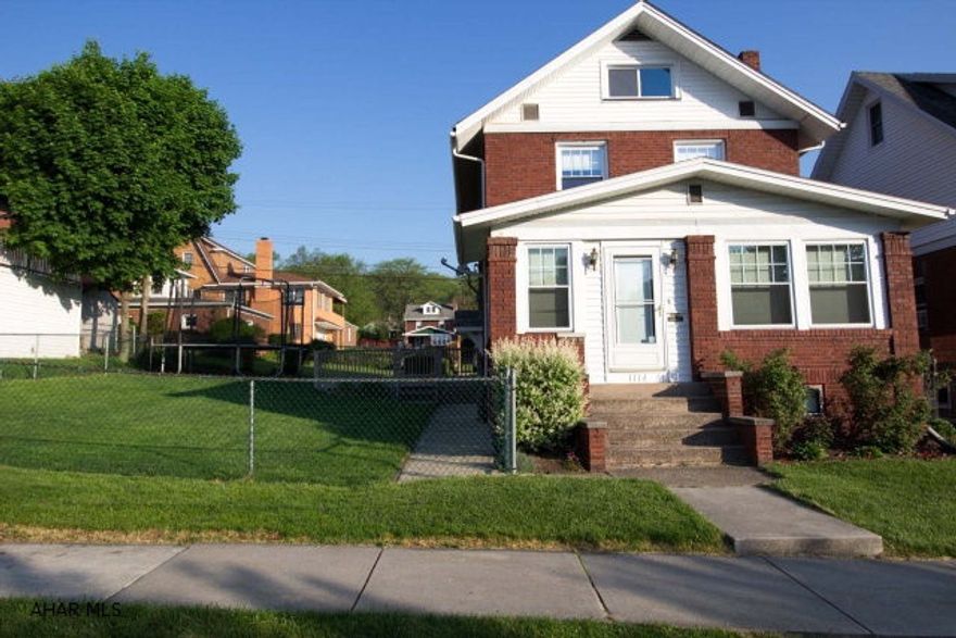 Gorgeous brick home on oversize lot near Keith Athletic field.  Gorgeous custom kitchen with European cabinet design and tons of storage.  Large bathroom with double bowl vanity.  Energy efficient home with two zone heat, Sanyo inverter split AC heat pump for extra savings on heat and air conditioning. Radiant (heated floors) downstairs, baseboard hot water upstairs.  Vinyl Low-E glass windows.  Laundry on the second floor.  Off street parking and large 2 car garage with opener. Basement recently waterproofed by professional.