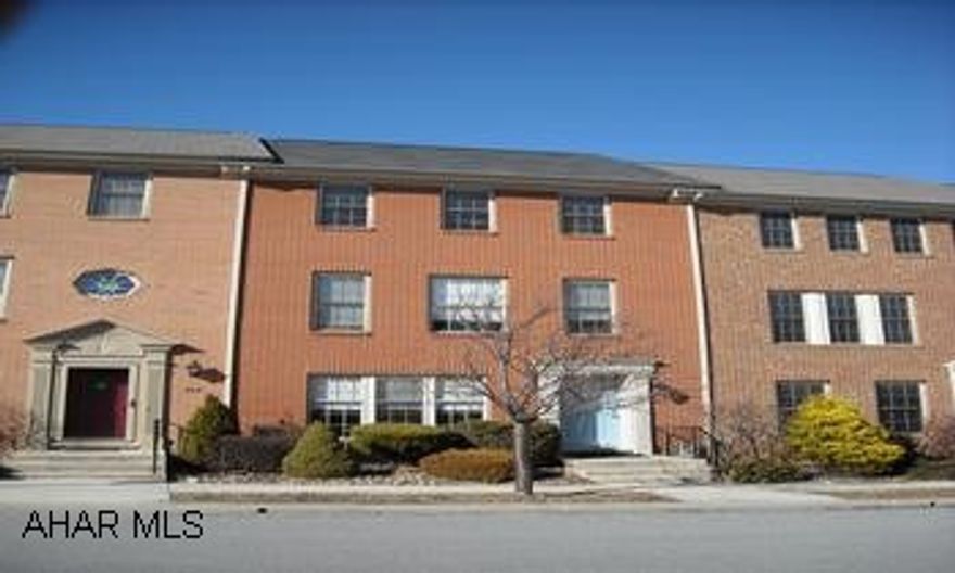 LIKE NEW BEAUTIFUL TOWNHOUSE IN HOLLIDAYSBURG WITH NICE UPGRADES! INCLUDES TWO CAR GARAGE, APPLIANCES & HOT TUB! LIKE NEW TOWNHOUSE WITH UPGRADES BUILT IN 1998, EXCEPTIONAL VALUE WITH 2 CAR GARAGE, LARGE REAR CEMENT PATIO WITH HOT TUB, CERAMIC TILE AND WOOD LAMINATE FLOORS, POSSIBLE LARGE FAMILYROOM IN BASEMENT, APPLIANCES! CALL MIKE MANGIA 932-8888.