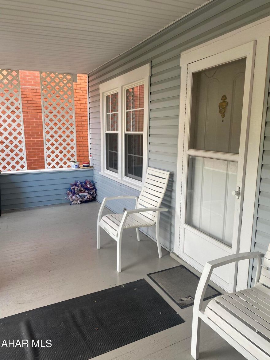 Take a look at this cute little starter home in the Juniata section of Altoona. Two nice size living rooms on the first floor with a a half bath. Two bedrooms with large closets and storage space. The back yard features a huge carport for easy access to the alley. A clean basement with a workshop. The covered porch is large and private. This house has a lot of external upgrades. New roof, siding and windows.