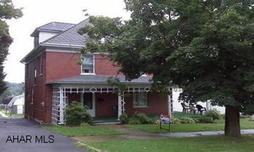 Nice 2 Story Brick - Close To High School - Enclosed Rear Porch Old World Charm - Large 2 Story Brick - Living Room With Fireplace - Eat In Kitchen - Wrap Around Porch - 4 Bedrooms - Shower Stall In Basement - Large Attic, Could Be Finished - Unknown If Fireplace Works, Owner Never Used - Multi Fuel Furnace - Coal/Wood/Oil
