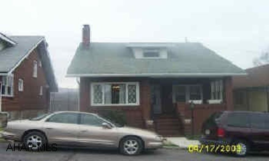 Beautiful 1 1/2 story brick home in great condition, 2nd flr is one big room with knotty pine tongue & groove walls and hw flrs. 1st floor has 2 bedrooms & 1 bath.    New windows throughout. Beautiful 1 1/2 story brick home in great condition.  2nd floor is one big room with knotty pine tongue and groove walls and hw flrs.  1st floor has 2 bedrooms & 1 bath.  The basement has been fixed up and has  a small kitchen, 3/4 bath, and large play area.   New windows.