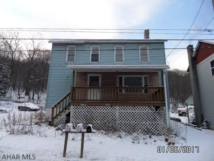 Some tlc would make this a great home, huge living room and kitchen with modern cupboards, 2 full baths, house must be connected to public sewer, worth a look