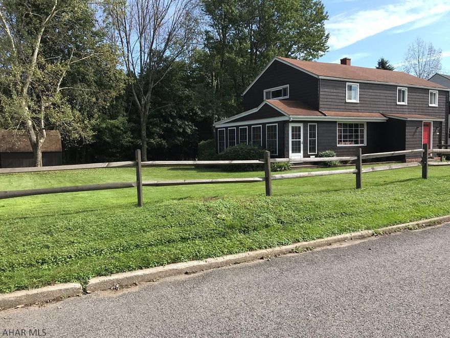 You'll fall in love with this charming two-story home, located on a large corner lot in an established, family-friendly neighborhood. Hardwood floors. Quaint wooden interiors. Bright, enclosed porch. Private back deck.  Kitchen features open cabinetry, butcher-block counters, and stainless-steel appliances.  Three bedrooms & office, & an extra spacious master bedroom w/ample closet space.  Generous living area that provides countless options for any style of living.