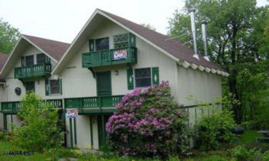 Furnished 2-Bedroom Condo with loft, 2 decks, woodstove, pergo floor in kitchen, dining area & living room, ceramic tile in bath. Dues include indoor & outdoor pools, hot tubs, tennis courts & trash. Sellers are licensed VA salespersons.   #J-191