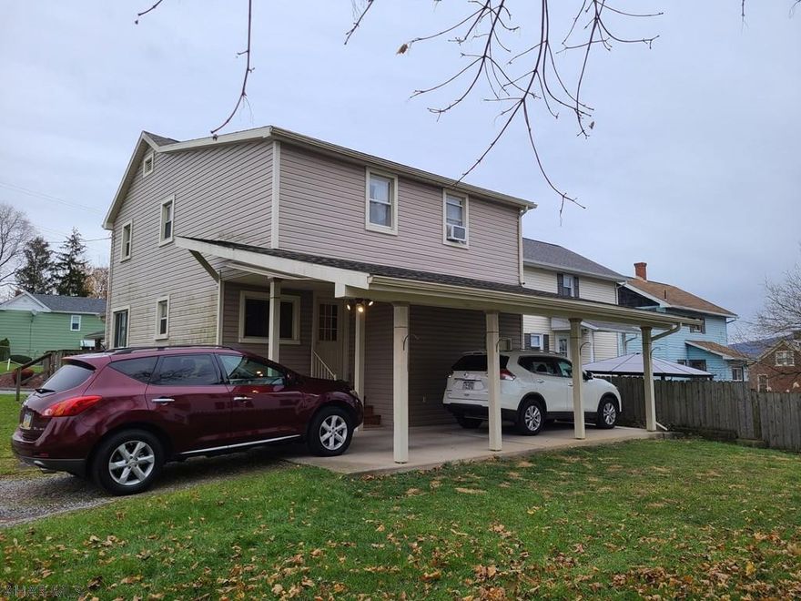 Nicely updated 3 Bedroom, 1.5 bath home in Hollidaysburg Borough.  Features include an open floor plan between the kitchen & dining room; center island, stainless appliances & tile floors in the kitchen; tile floors in the bathrooms, mud room & laundry area; new carpeting up the steps and in 2 of the bedrooms; laminate flooring in the living room, office & master bedroom; built-ins in the mud room & office; first floor laundry & bath; insulated windows; covered carport/patio; off-street parking; an attached shed (with basement access); a quiet neighborhood; and a maintenance free exterior.