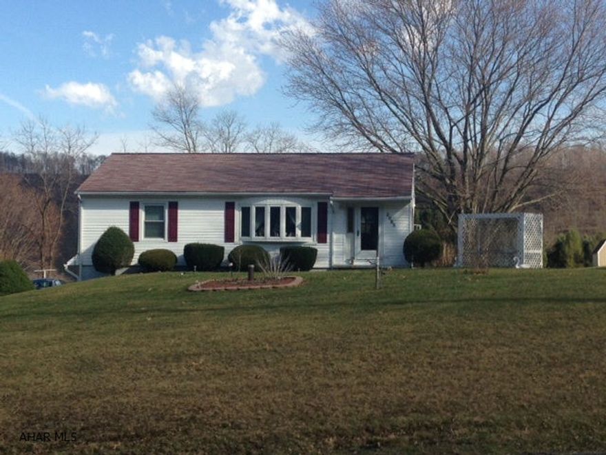 Well kept 3 bedroom, 2 bath ranch home on more than 1/2 acre. Spacious living room with large bay window. Beautiful original hardwood floors. Finished basement. Move in ready!