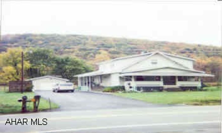 Currently 2 family residence with 2 septic tanks & cesspool.  Home does have the ability to be a single family residence if desired. This property is occupied by both the owner and tenant.