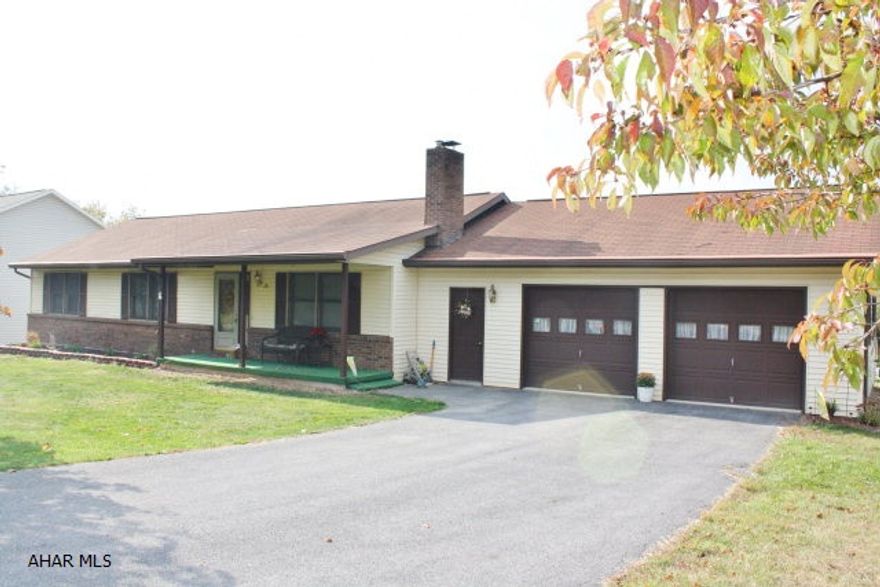 Lovely ranch on large, treed corner lot. Warm & spacious, this home has a master bedroom with 3/4 bath, main floor laundry, & family room with gas fireplace in basement. New heat pump & low utility bills.
