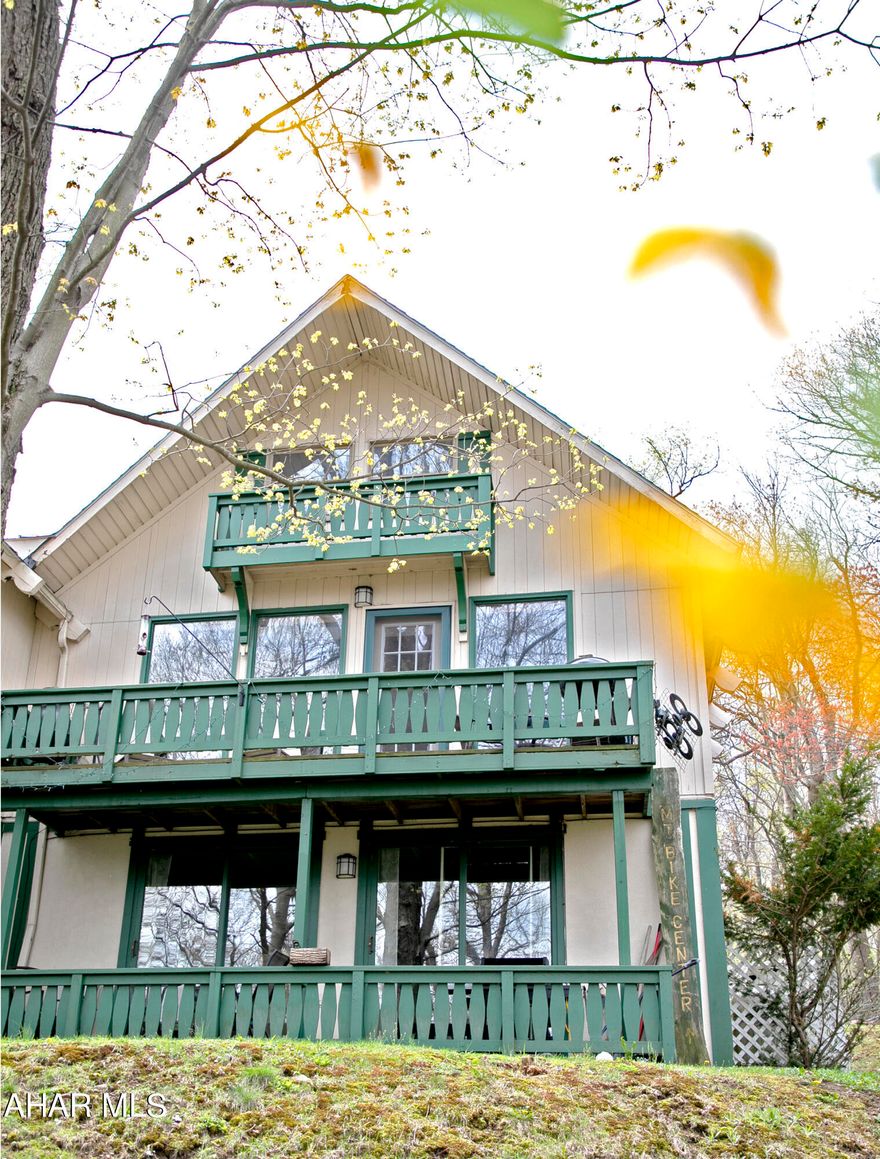 Fully renovated with elevated finishes, this 2-bedroom 1-bathroom condo at Blue Knob All Seasons Resort is the perfect opportunity for a buyer looking for an investment property or full-time residence. Located in the highly sought after Pinecone condominium development, this property features marble mosaic tile floors, new durable Purgo laminate flooring, handcrafted Moroccan Zellige backsplash, and aesthetic furnishings all curated by a local interior designer. The open plan living space features a vaulted ceiling, gas fireplace, and back porch that overlooks the countryside. Fully furnished and ready to move in. This property provides direct access to hiking/mountain biking/cross-country skiing trails and is located just minutes from ski slopes, outdoor pool, tennis courts, golf course, and Clubhouse Bar & Grille. Must see! Call the listing agent to schedule a showing!