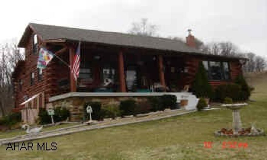 Log home with loft bedroom- 2 thermostaticly controlled propane gas fireplaces. Awesome view - large great room. 5 miles to I-99. $1,000 towards buyers closing costs.
