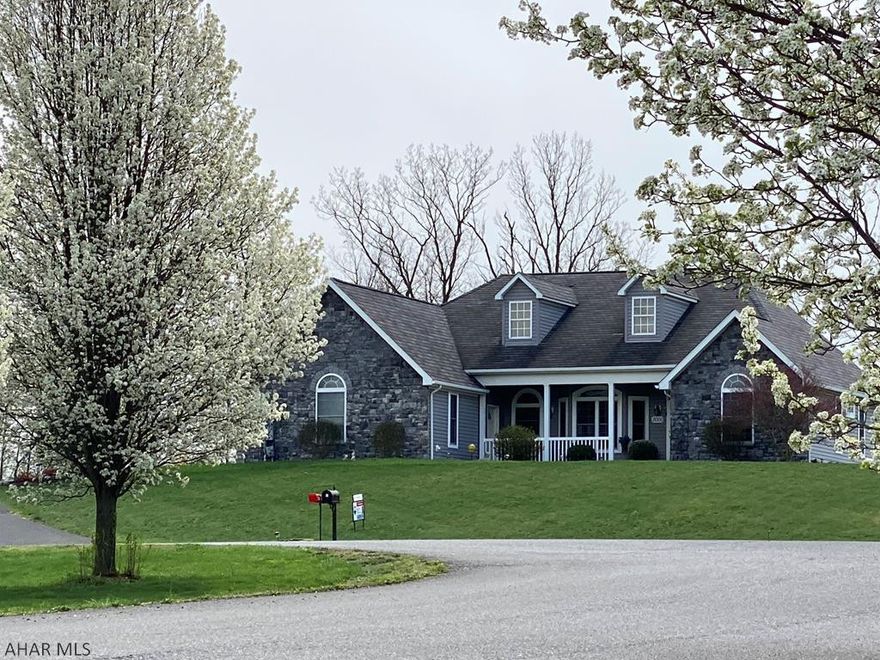 This custom built executive home was built to take in views that will captivate and leave you speechless!  Views span the horizon for miles and the designer did not disappoint in creating a home designed around this view!  The minute you walk in, your eye is immediately drawn to the wall of windows that surround rooms.  Entertaining spaces blend seamlessly from interior to exterior rooms.  Enjoy cooking as you entertain and enjoy views that make cooking a joy.  Cathedral and tray ceilings add fabulous architectural appeal while a private owner's wing is privately located with separate walk out to private deck.  The finished lower suite is great for guest and family to entertain.  3 large car garage with tons of bonus space.  Wonderful home inside and out!