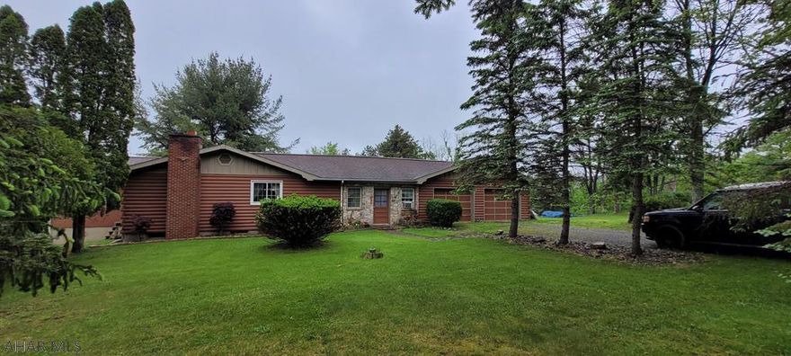 Welcome to 293 Ridge View Lane in Hollidaysburg School District. Sitting on an acre of ground this home feels private but close to everything. This 3 bedroom home features a breezeway to the attached 2 car garage, eat in kitchen, living room with wood fireplace and a basement with additional unfinished space. The back patio has sliding doors off the breezeway for entertaining.  Call for your showing today.