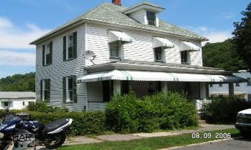 2 story, corner lot, nice neighborhood. Must sign " As Is Addendum"