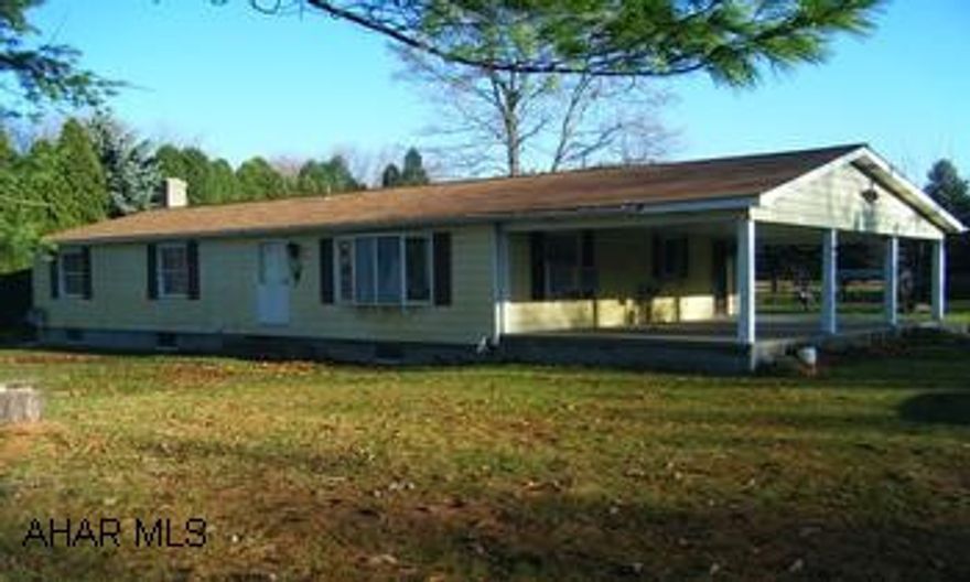 Sectional home on full basement, 40x40 aluminum garage and .8 acre. Bank owned. The 3rd bedroom has been converted to a first floor laundry room with 220 plug and washer hookup. It could easily be made a bedroom again. Electricity by REA.