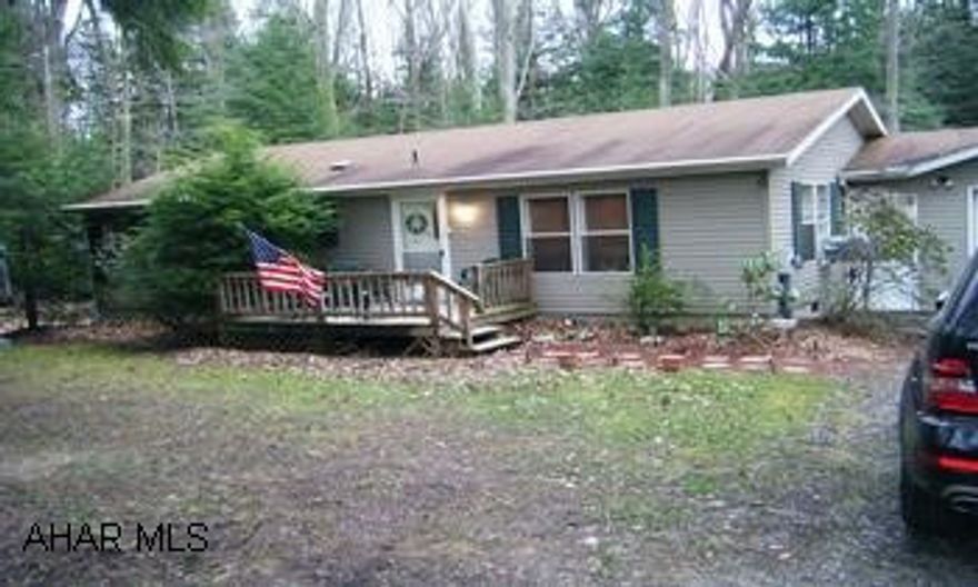 One story sectional home with breezeway and garage. Good condition. Glendale Yearround offers community pool, tennis courts, baseketball court, pavillion, community center and more. Yearly fee is approx. $320.