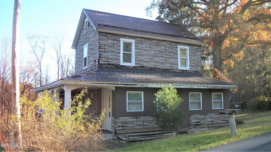 Attention investors. This solidly built house is worth taking a look at.  Situated on 1.9 acres, this home offers 3 bedrooms, one bathroom, a laundry room and a full basement.  It had a metal roof  installed in 2012.  With a bit of TLC, it could provide rental income for years to come or turned into home, sweet home.  It's location offers easy acess to Raystown Lake, State Game Lands and all that the area has to offer. Property being sold ''as-is'', seller will make no repairs.  The well on the property is shared by a neighbor.  There is no shared well agreement in place.  There is no heating source in place; the furnace was removed.  The heat duct work is in place.