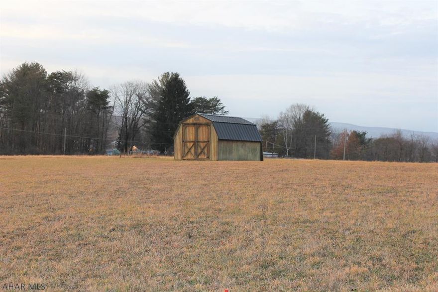 Location AND views!!!  Build your dream home on this nice open building lot located directly off Yingling Road in the town of East St Clairsville, Osterburg.  This lot is a diamond in the rough with beautiful mountain views and easy access to Route 220 and 99.  Watch as the deer graze the fields in this beautiful country setting located off a quiet no outlet road.  No need to worry about storage, this lot already has a shed on the property!   Conveniently located between Bedford and Claysburg and an easy commute to Altoona and Johnstown.   The potential is endless and just awaiting your future home!   Municipal water and sewer available for hookup.  So call now and lets unlock your future today!