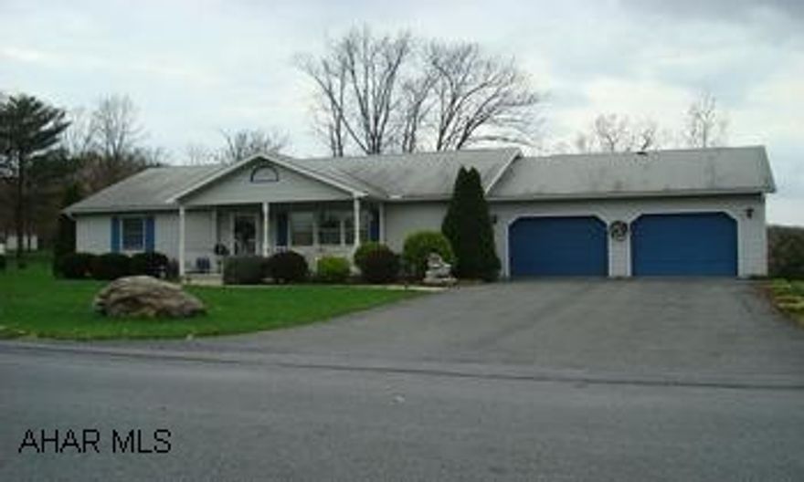 Four Bedroom, 2.75 bath ranch home. Wonderful 4 bedroom ranch with two car attached garage on a beautifully landscaped lot in Lakewood manor.  Lots of living space in with the large living rooms upstairs and down, eat-in kitchen, and perfect for enertaining with the large enclosed sunroom and open and covered decks out back.  With rising energy costs this home offers effeciency at its best with a natural gas heat pump and updated windows.  A great home for any family.  Call Chris to make your appointment today at 814-285-2533