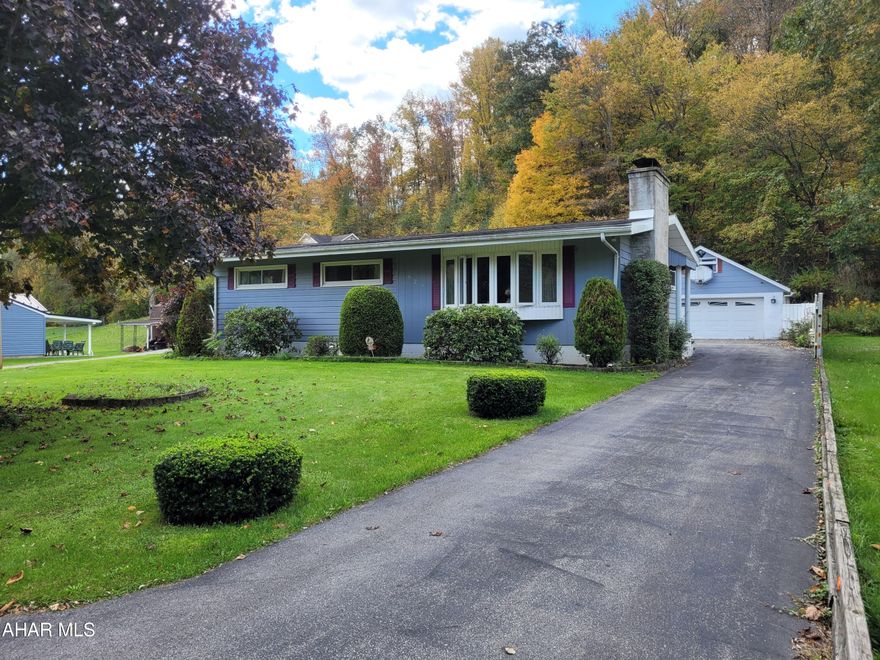 3 bedroom, 1 bathroom Ranch house with enclosed patio and detached 2 car garage.