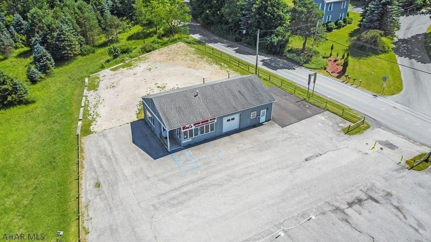 1661 Wilmore Road is a former Automotive Sales Office and features a free-standing retail building with plenty of space for additions or parking. This site presents the unique opportunity to enter the growing Ebensburg market with great visibility along Rt. 22 W. (23,000 VPD). With the convenient access and large lot at a busy intersection, this site is ideal for any Quick Service Restaurant, Medical Use, Automotive Use, & so much more! This property is in close proximity to national retailers such as Walmart, Aldi, Tractor Supply, Dunkin', McDonalds, & Starbucks just to name a few.