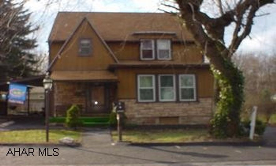 Real nice 3 bedroom, 1.5 bath home with charm of yesteryear.  Natural woodwork with french doors, hardwood floors, fireplace/woodburner, sunroom, newer roof and windows, fenced yard, carport, and new workshop or shed.  New 100 amp breakers.