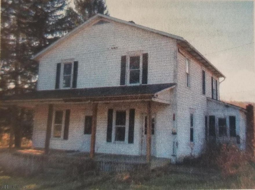 Interior of home has been gutted down to frame work.