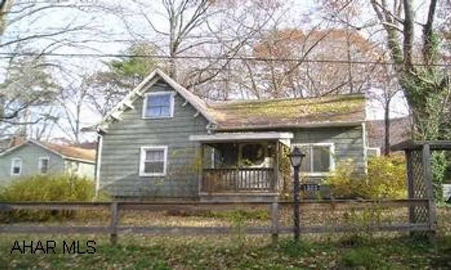 Currently last home on dead end street.  Needs work but has lots of potential.  Property fronts Rosehill Drive, access to driveway over adjoining parcel of land.   This property is being sold "AS-IS", "WHERE-IS".