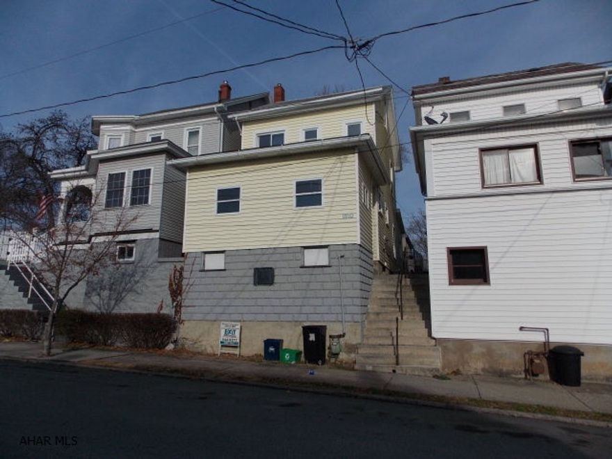 Large home with detached garage.  New furnace, roof, water heater, and all new vinyl siding.