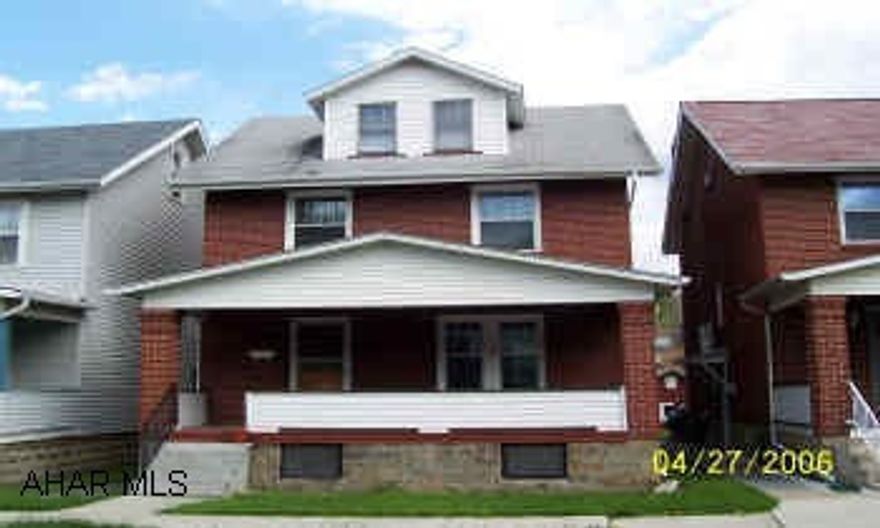 2 1/2 story brick This great brick Fairview property has new windows, a new furnace, and a new hot water tank along with a garage.