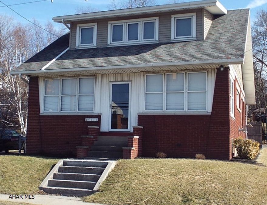 Charming and immaculate 3 bedroom, 1.5 bath home. French doors and leaded glass windows accentuate a move-in ready home. Natural woodwork and stained glass windows add to the character. Full unfinished basement with laundry, 1/2 bath and workshop. Off street parking.