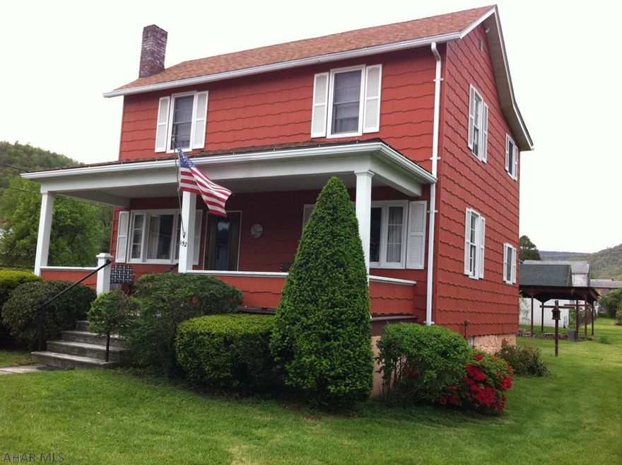 Come relax on the front porch and take in the beauty of Bedford Street!! Situated on a corner lot this 1889 home offers 4 bedrooms and 1.5 bath with knotty pine wall covering throughout.  The main level you will enjoy a spacious living room and side den/office connecting to the dining room and kitchen.  The laundry room is on the main level in the half bath.  The second level offers 4 bedrooms and full bath.  Don't forget about the knotty pine throughout and built in cabinets! In the back yard you will find grapevines and many trees for shade.  Go ahead and park in your own carport located in the back of the home.  Located in the heart of Hyndman. 26 mins from Cumberland, MD and 36 minutes to Bedford, PA.  Come see what else this property has to offer!