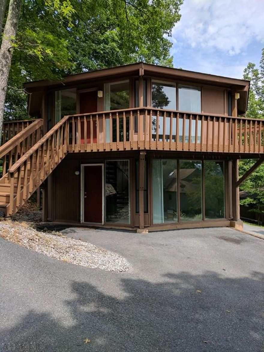 Welcome to your new getaway spot complete with a view of the Bedford Springs Golf Course!  This 2 bedroom, 2 bath home comes not only with a fantastic view, but also has central air, with an open kitchen in which all appliances are included!  Come out and experience this property for yourself!  Motivated sellers!