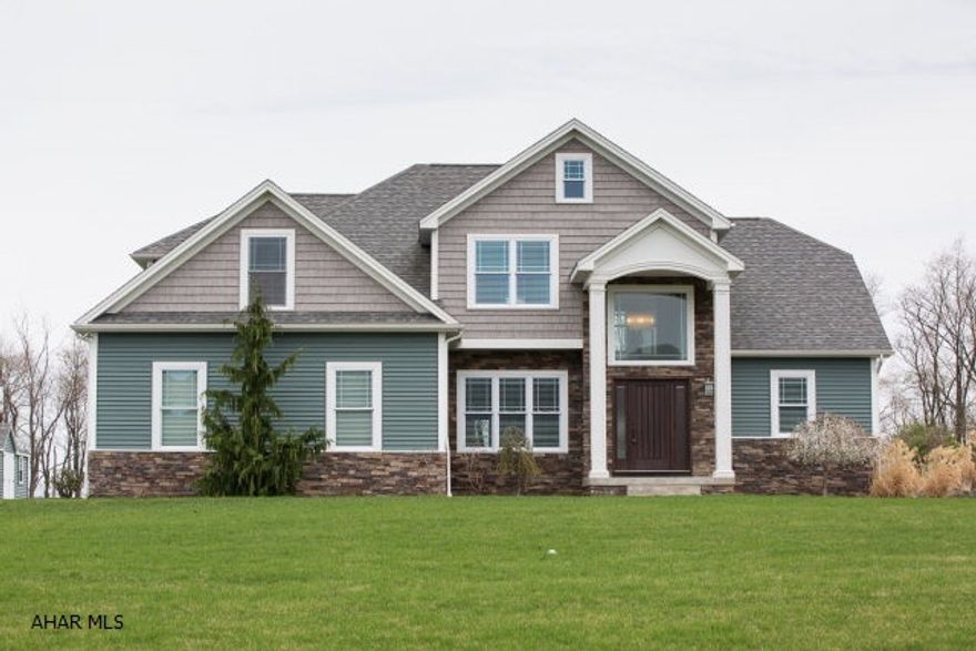 Dramatic Crossman and Castle custom-built home with spectacular views.  Spacious open floor plan makes for great entertaining both inside and out from the custom kitchen with Ceasarstone countertops to the 2-story great room with gas FP to large covered patio and heated salt-water, fenced, 18X36 in-ground pool.  Built with amazing quality, the home features a main level deluxe master bedroom suite with huge bath and walk-in closets.  The formal dining room and breakfast nook are open to the kitchen.  Upstairs you will find 4 bedrooms as you cross over the 2nd flr balcony that overlooks the main level. The massive basement was just totally finished and has a family room, billiard area, exercise room and theater room wired for surround sound.  Another 3/4 bath with shower just completed.