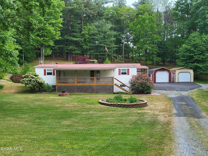 One story home on 2 acres with 2 car garage and 2 huge sheds! Large patio area with firepit.  The inside of the home features new flooring throughout the entryway and kitchen. Custom Poplar, Oak and Maple bedrooms with hardwood flooring. Basement is ready for finishing! Private setting!