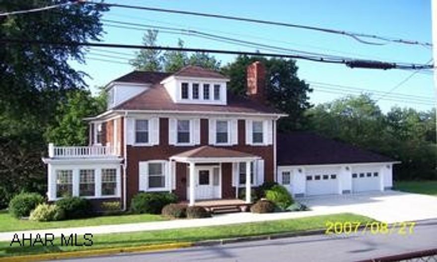 2 story brick home, custom cherry kitchen, 3 extra rooms on third floor that could be used as bedroom or other options, on 6 lots. 2 story brick home.  Beautiful custom cherry kitchen.  Home has 3rd floor with 3 extra rooms that could be used as bedrooms or other.  Located on 6 lots.