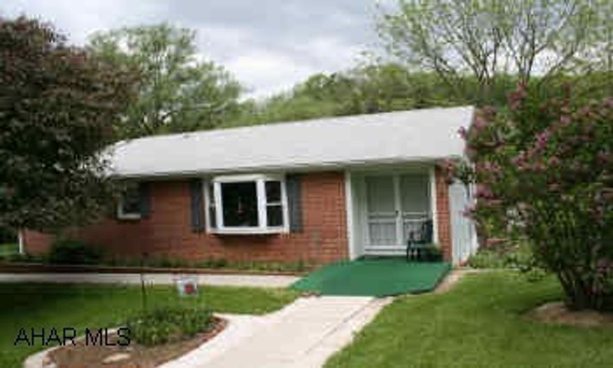 Nature Lovers Dream; Brick/vinyl ranch located on 5 acres; tranquil country setting w/stream; beautiful landscaping w/large trees, many perennial flower beds and wood bridge that crosses over the strea,. Master suite, eat-in kitchen, dining room, family room, deck.