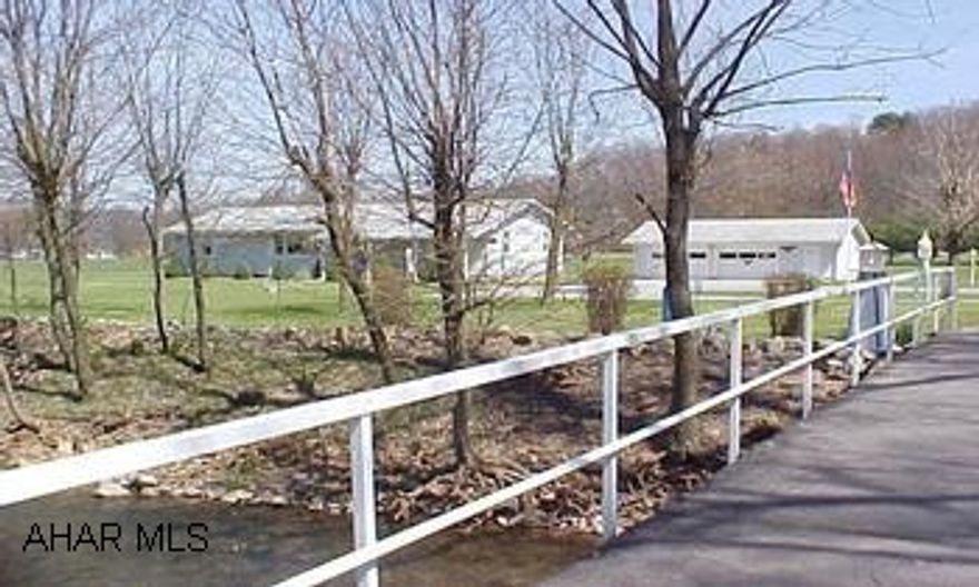 I-99 East Freedom exit, RT 36 S .6 miles, L @ McKee Electric onto ShMeticulous home with 2-tier deck, open floor plan, circular drive,  2 plus garage with workshop, with approx. 16 acres.  Bridge with pole light post overlooking Haltercreek. Listing J-861 I-99 East Freedom exit, RT 36 S .6 miles, L @ McKee Electric onto Shoenfelt, 2nd property on R over Bridge.Meticulous home with 2-tier deck, open floor plan, circular drive,  2 plus garage with workshop, with approx. 16 acres.  Bridge with pole light overlooking haltercreek.   Tax ID # 9-7A-13-2  9-7A-13B & 9-7-18   Listing J-861