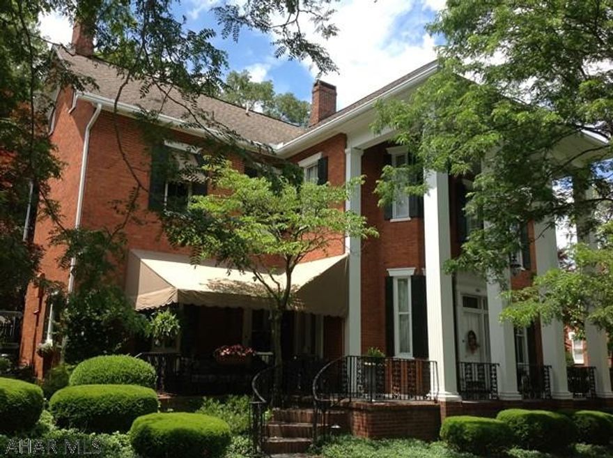 Built in 1875-142 years ago-by Dr.Simon Gump. This is one of the most stately and admired homes in Bedford. The main floor features a large Living with impressive F/P , den/ tv room with fireplace, eat in kitchen with cherry cabinets, impressive dining room with Waterford Crystal chandelier and updated powder room. On the second floor are 3 bedrooms , 2 1/2 baths plus a sitting room with fireplace. Also there is an additional room that has been used as an office but could be used for other purposes. The third floor space has a 3/4 bath and 3 large rooms.  Porches, patios and outside fireplace add ambience to this special property.  One of a kind home for a qualified buyer.