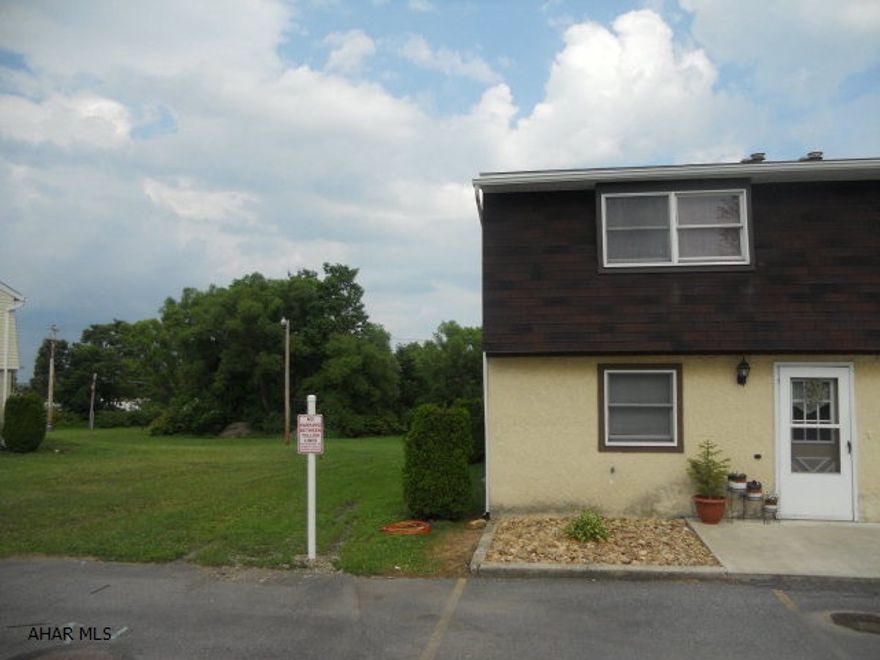 A perfect townhome positioned in a prime location as an end unit offering 2 bedrooms and 1.5 baths in a nice area within Duncansville. The spacious backyard opens into a flat area bordering a small stream. The townhome is in a well-maintained private community but is still close to stores & shopping. Located in Hollidaysburg school district. The HOA fee includes the following: access to the in-ground swimming pool,lawn care, snow removal, trash removal, exterior building updates (roof & siding).