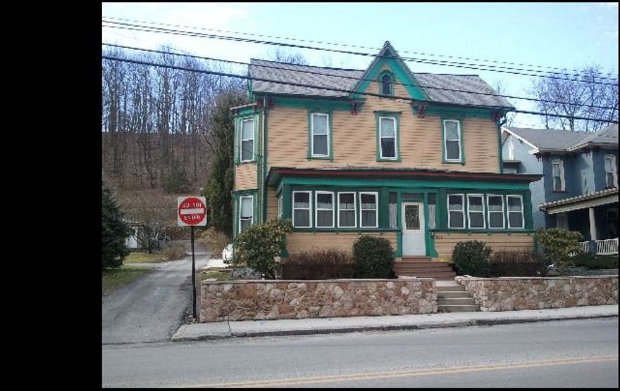 Beautiful Victorian with 2 staircases and lots of charming built-ins and alcoves. Built in the 1880's by Frederick A. Kneiss, the head carpenter for the PA Railroad.  Most of the furniture will be made available for sale to the ultimate buyer. Paved alley leads to concrete parking pad.  Quaint brick courtyard off of the kitchen. Park is across the street and the back yard backs up to the woods. PRICED FOR QUICK SALE!