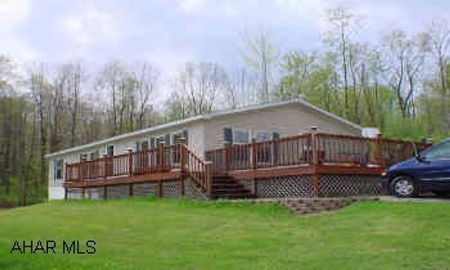 28x56 Holly Park Double Wide on rented lot at $240 mo., which includes sewer, trash and snow removal. Large wrap-around deck, tool shed, and off-street parking. 28x56 Holly Park Double Wide on rented lot at $240 mo., which includes sewer, trash and snow removal. Large wrap-around deck, tool shed, and off-street parking.