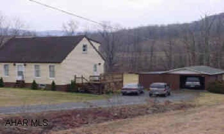 1 & 1/2 story with 1.3 acres. Two bedroom, and one bath on first floor finished. Second floor framedin but not finished. Full basement with bath room facilities available. !984 1 1/2 story home on 1.3 acres. Second story not finished. Basement has bath room facilities hookup availiable. One car garage and a storage shed. One side of property line is a creek.