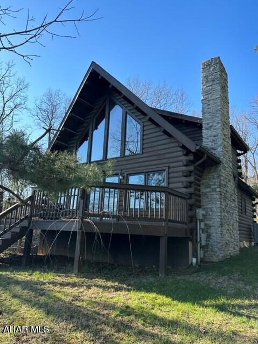 Rare find!!! Quality log cabin with fabulous view and just minutes to the 322 expressway, quality DeHaas Builders home, would make a great primary residence, vacation home or even potential investment property, wake up each morning in the owner suite to the fabulous view of Tussey Mountain, owner suite has ample closet space and full bath, living room fireplace will keep you warm this spring, kitchen with Corian counter tops and stainless appliances, one story living is an option with main floor bedroom and laundry, the basement opens at grade and could be finished for additional living area, integral garage, paved driveway with lots of area to park, wraparound deck is perfect for relaxing or entertaining this summer, private, close to recreations areas, Mt Nittany Hospital, minutes to Beaver Stadium and downtown State College.