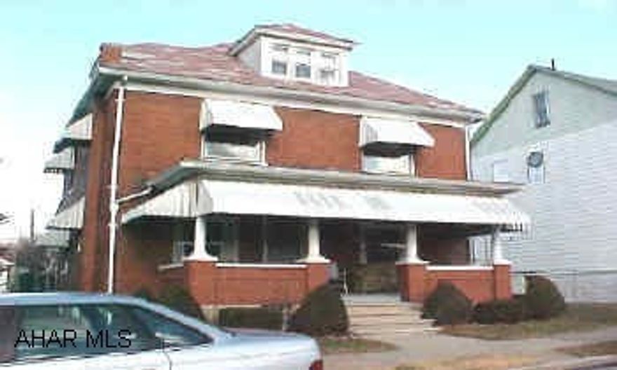 Nice four bedroom brick on a double lot.  Large rooms.  Semi-modern kitchen and formal dining room.  New roof installed last year.