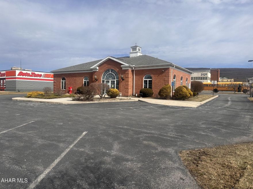 FOR LEASE- ALTOONA- COMMERCIAL-ENTIRE BUILDING AVAILABLE.  Great location with high visibility on corner signalized lot. 20 parking spaces and potential for more. Impressive brick building with high end interior. Reception area/ lobby, 7 offices, kitchenette, conference room, 2 bathrooms, 8 workstation desk areas.  Approx. 3,390 Sq. Ft. $4,500 per month.  Owner will subdivide space & tenant was previously an insurance office.   Owner is a licensed PA Real Estate Broker.